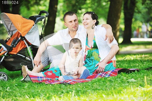 Image of Family at park relaxing and have fun