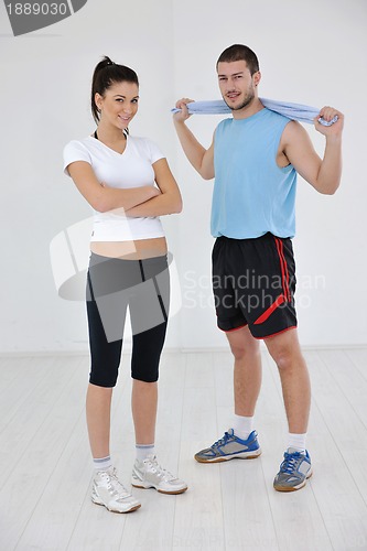 Image of happy young couple fitness workout and fun