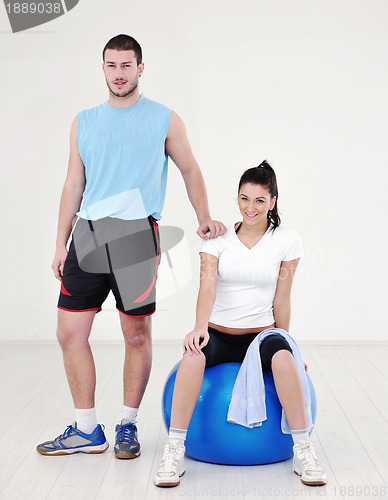Image of happy young couple fitness workout and fun