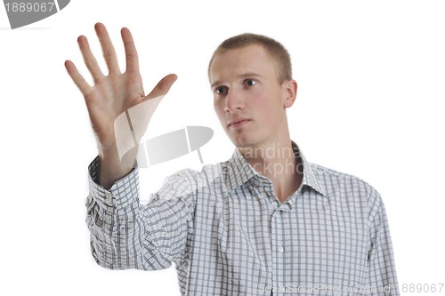 Image of handsome young business man touching screen isolated