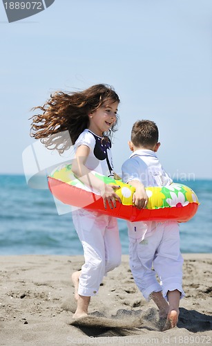 Image of happy young  people group have fun on beach