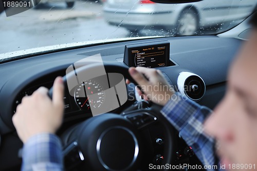 Image of man using car navigation