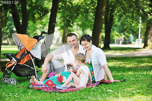 Image of Family at park relaxing and have fun