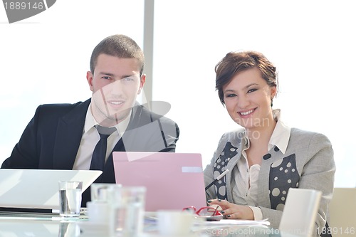 Image of group of business people at meeting