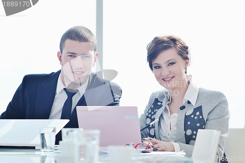 Image of group of business people at meeting