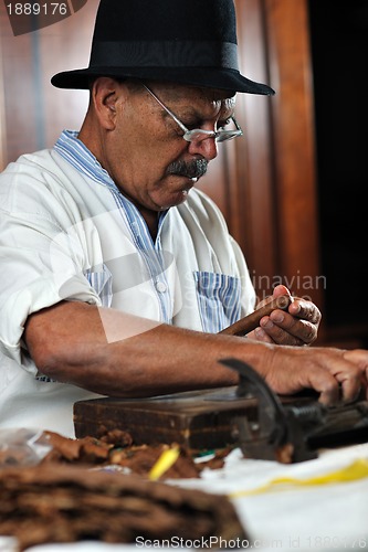 Image of man making luxury handmade cuban cigare