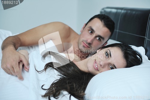 Image of young couple have good time in their bedroom