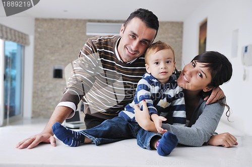 Image of happy young family have fun  at home