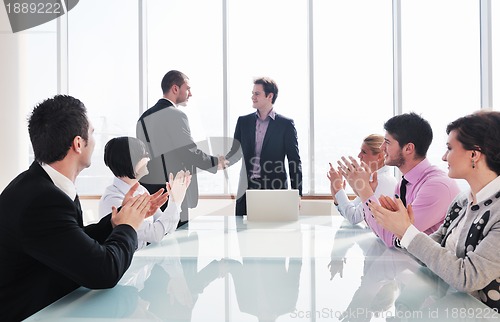 Image of group of business people at meeting