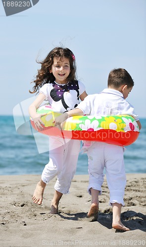 Image of happy young  people group have fun on beach