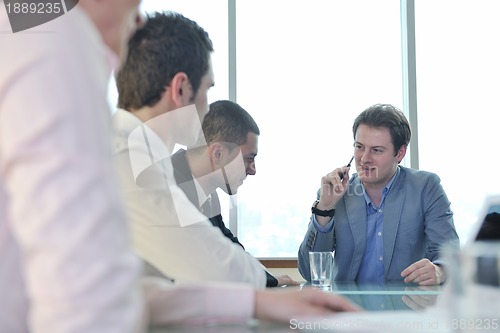 Image of group of business people at meeting