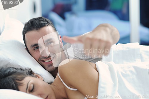 Image of young couple have good time in their bedroom