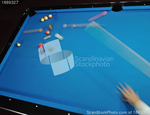 Image of young man play pro billiard game 