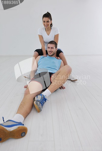 Image of happy young couple fitness workout and fun
