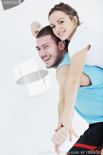 Image of happy young couple fitness workout and fun