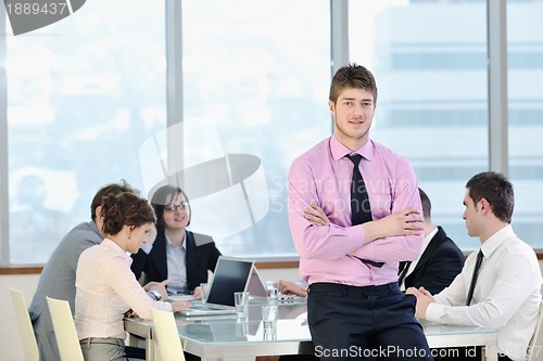 Image of group of business people at meeting