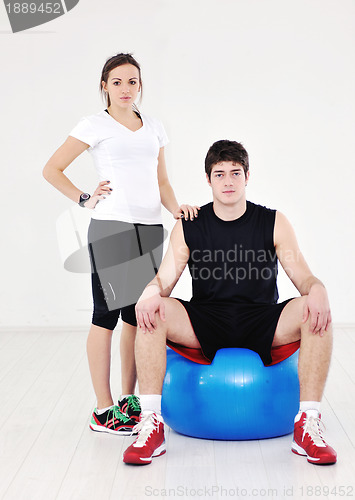 Image of happy young couple fitness workout and fun