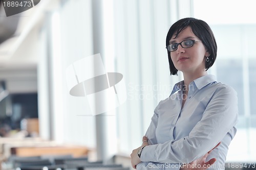 Image of young business woman on meeting