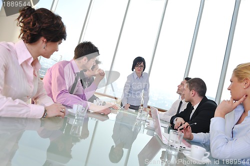 Image of group of business people at meeting