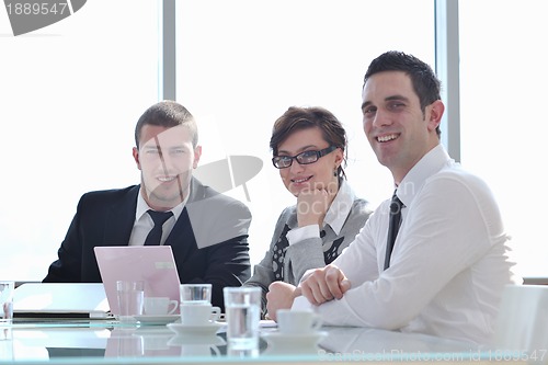 Image of group of business people at meeting