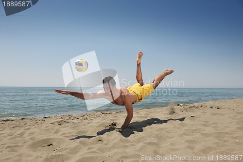 Image of male beach volleyball game player