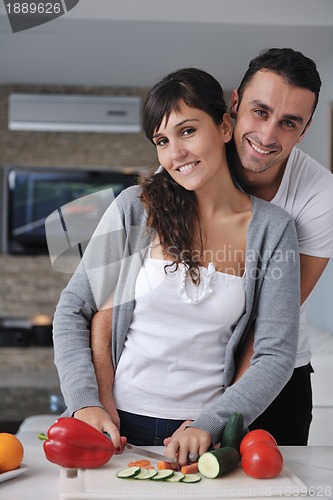 Image of young couple have fun in modern kitchen