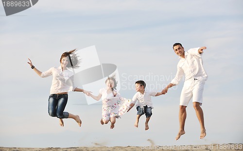 Image of happy young family have fun on beach