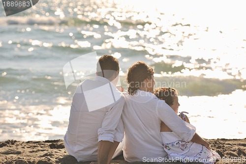 Image of happy young  family have fun on beach