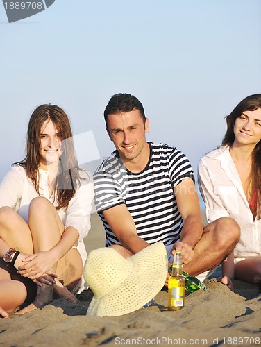 Image of happy young  people group have fun on beach