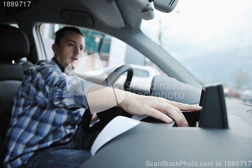 Image of man using car navigation