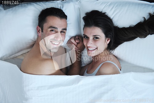 Image of young couple have good time in their bedroom