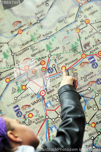 Image of girl with city map panel