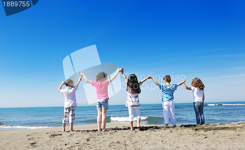 Image of kids playing on beach
