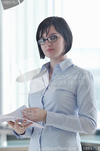 Image of young business woman on meeting