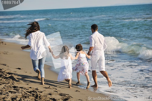 Image of happy young  family have fun on beach