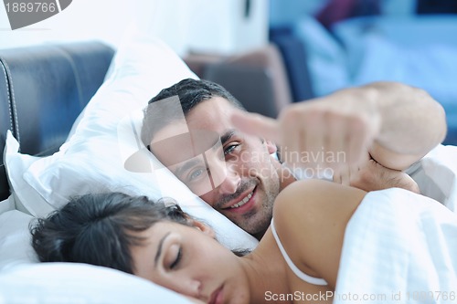 Image of young couple have good time in their bedroom