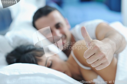 Image of young couple have good time in their bedroom