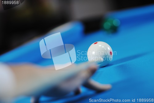 Image of young man play pro billiard game 