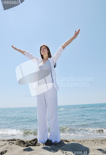 Image of young woman relax  on beach