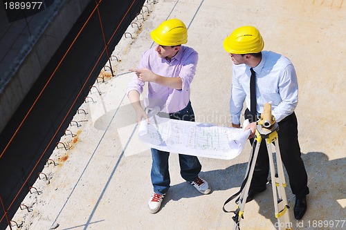 Image of Team of architects on construciton site