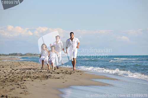 Image of happy young  family have fun on beach
