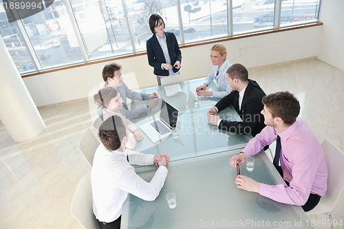 Image of group of business people at meeting