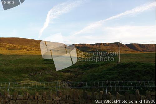 Image of sun on the hillside