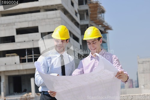 Image of Team of architects on construciton site