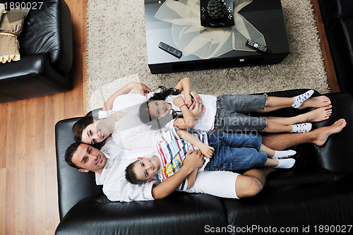 Image of young family at home
