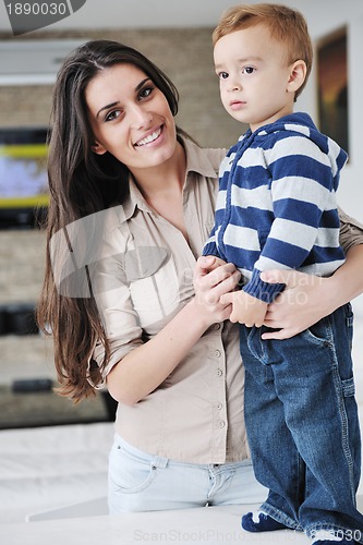 Image of happy mom and son together at home
