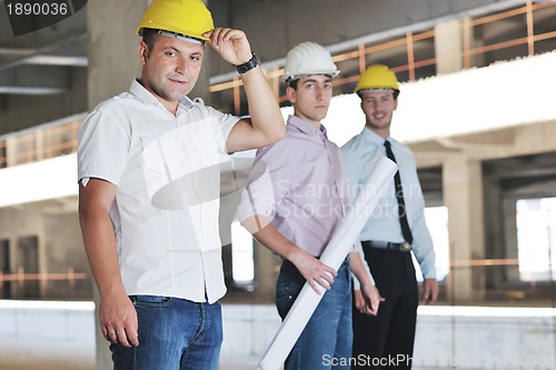 Image of Team of architects on construciton site