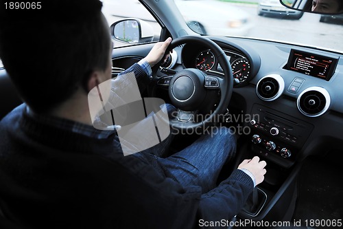 Image of man using car navigation