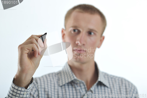 Image of handsome young business man touching screen isolated