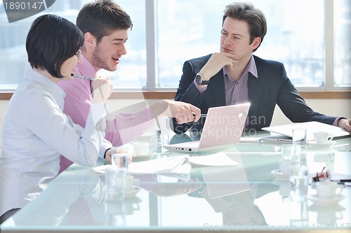 Image of group of business people at meeting